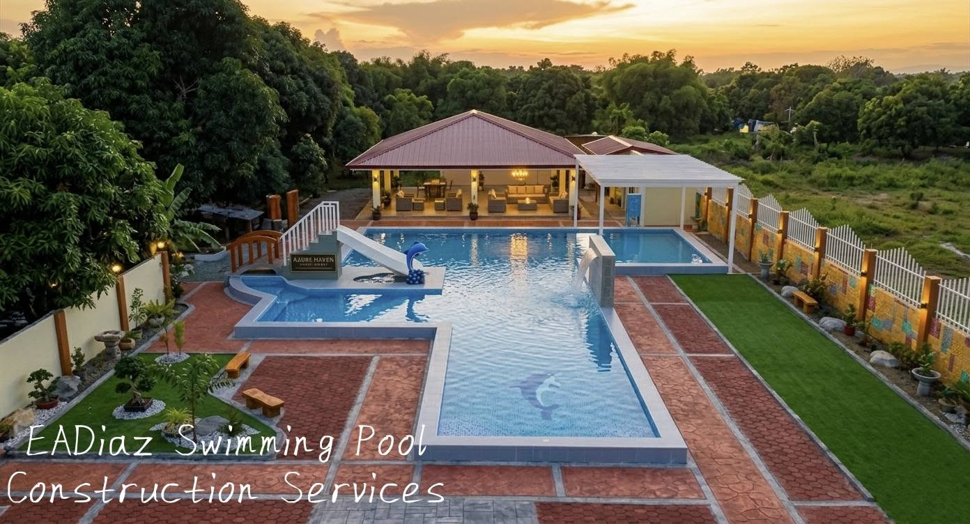 Elevated view of a pool with a slide, garden and pavilion